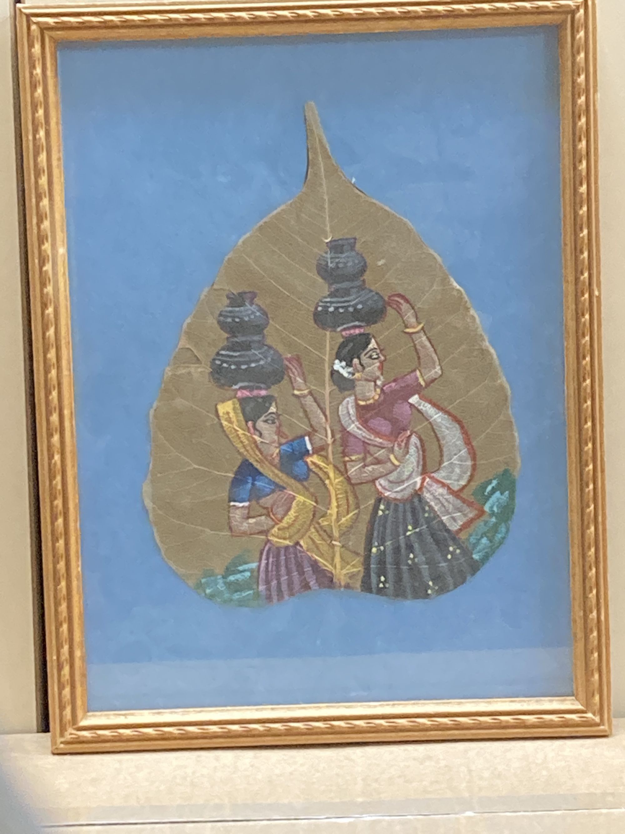 Indian School, five assorted gouaches, including figures in a garden and a painted mulberry leaf, largest 30 x 20cm